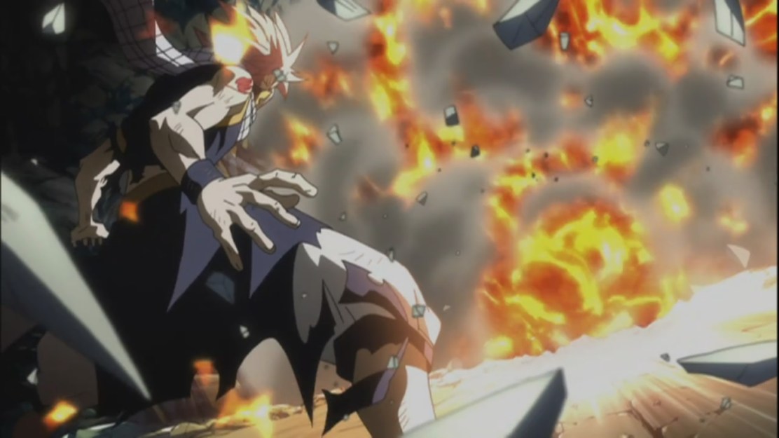 Rogue overwhelmed by Natsu's fire